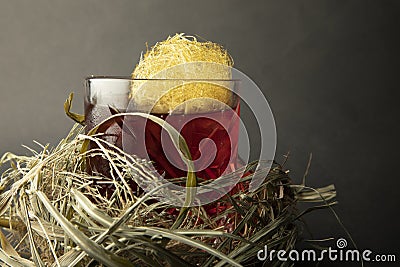 Fireball whisky cocktail wrapped in a nest. Stock Photo