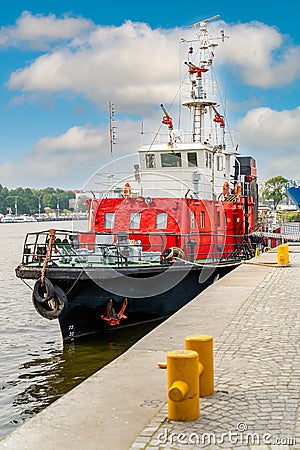 Fireboat or firefighter ship equipped with multiple water cannons and extinguishers Stock Photo