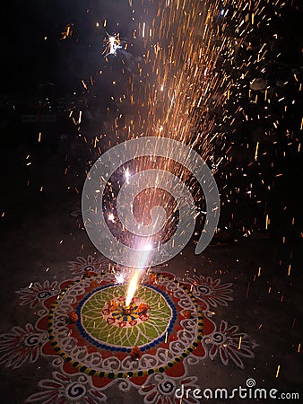 Firecracker light with beautiful rangoli Stock Photo