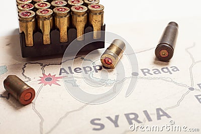 The fired cases and bullets from rifle. Background view on section area of Aleppo, Syria. Stock Photo