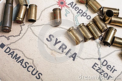 The fired cases and bullets from rifle. Background view on section area of Aleppo, Syria. Stock Photo