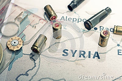 The fired cases and bullets from rifle. Background view on section area of Aleppo, Syria. Stock Photo