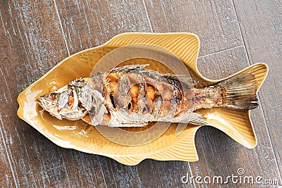 Fired fish in fish plate delicious thai food Stock Photo