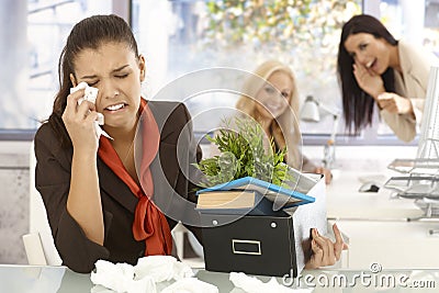 Fired office worker crying at office Stock Photo