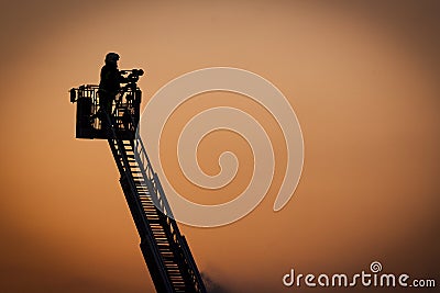 Firefighter in action Stock Photo