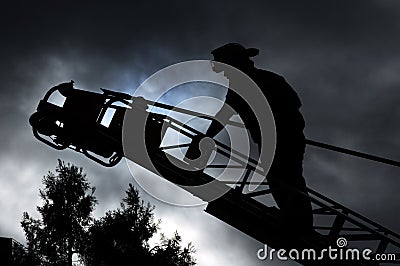 Firefighter on ladder Stock Photo