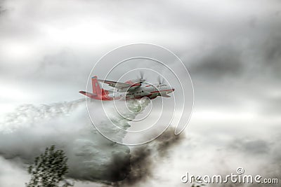 Firefighter plane dropping water Editorial Stock Photo