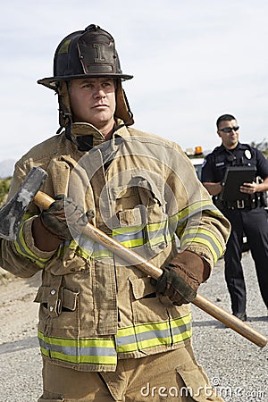 Firefighter With Police Officer Stock Photo
