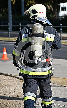 Firefighter at the scene of a fire Stock Photo