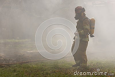 Firefighter in Smoke Stock Photo