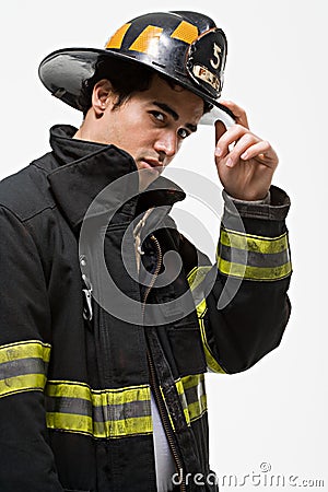 Firefighter tipping his hat Stock Photo