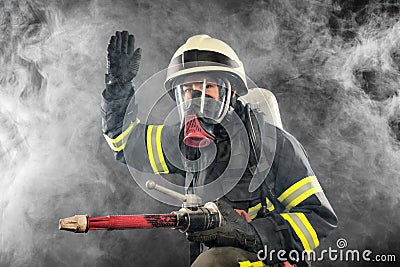 Firefighter at work Stock Photo