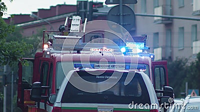 Firefighters Getting out of the Fire Truck Editorial Stock Photo