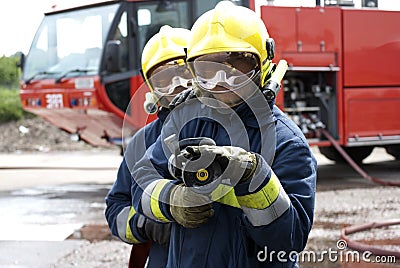 Firefighters hose Stock Photo