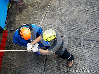 Firefighters are rappelling and climbing ropes Editorial Stock Photo