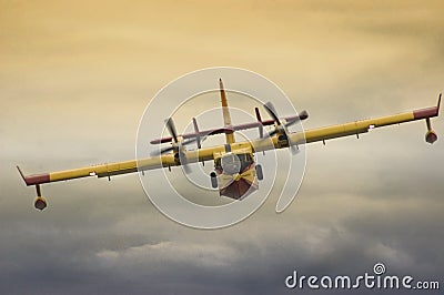 Firefighting aircraft flying low during exhibition Stock Photo