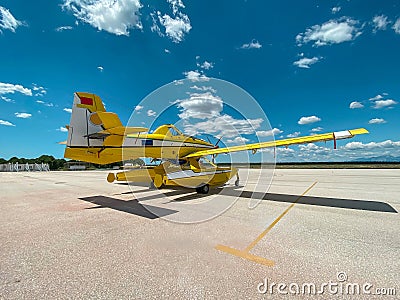 Firefighting aircraft parked on the runway and capable of landing and taking off on water Stock Photo