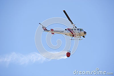 Firefighting California helicopter with water bucket Editorial Stock Photo