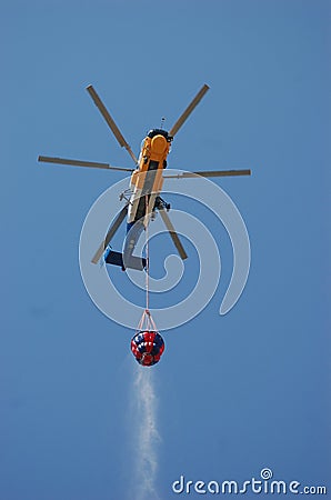 Firefighting by helicopter in Rhodes Stock Photo