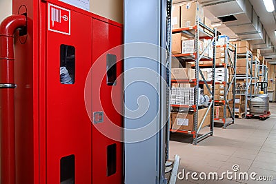 Firehose in warehouse. Fire safety. fire and safety equipment Stock Photo