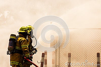 Fireman on the fire Stock Photo
