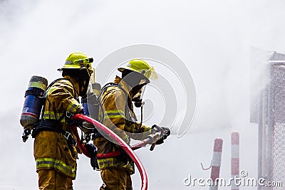 Fireman on the fire Stock Photo