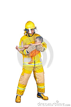 Fireman rescued the child from the fire Stock Photo