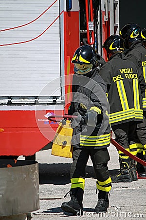 Firemen extinguish a simulated fire Editorial Stock Photo