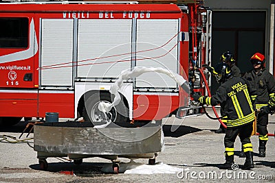 Firemen extinguish a simulated fire Editorial Stock Photo
