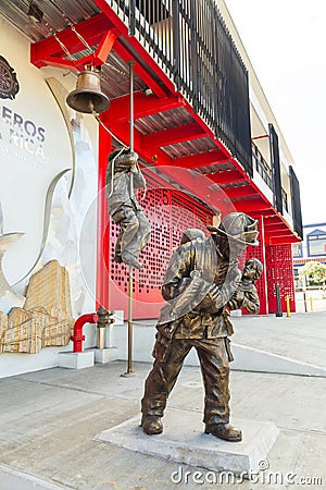 The firemen sculptures in front of the North Metropolitan modern fire station Editorial Stock Photo