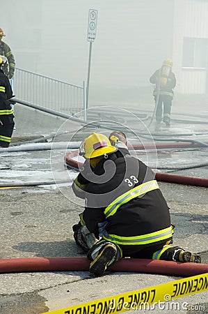 Firemen at work 6 Stock Photo