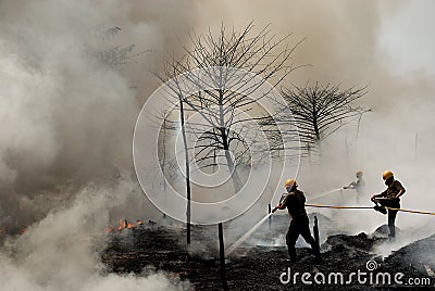 Firemen at Work Stock Photo