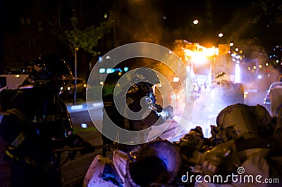 The firemen work in a night fire. Madrid Spain. Editorial Stock Photo