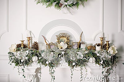 Fireplace decorated with Christmas decorations Stock Photo