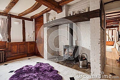 Fireplace within heavily beamed room Editorial Stock Photo