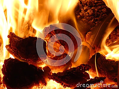 Fireplace - Hot Flames of Burning Coal Lumps and Heat Stock Photo