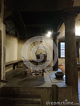 The fireplace of the old friars& x27; kitchen in the Badia a Passignano abbey Chianti Tuscany Italy Stock Photo