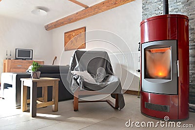 Red stove pellet in a living room Stock Photo