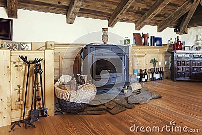 Fireplace in a rustic attic room Stock Photo