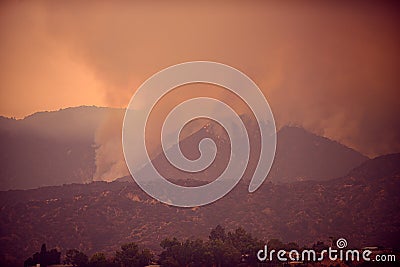 Fires and air pollution. Smoke and fire in the mountains of California. Climate change. Stock Photo