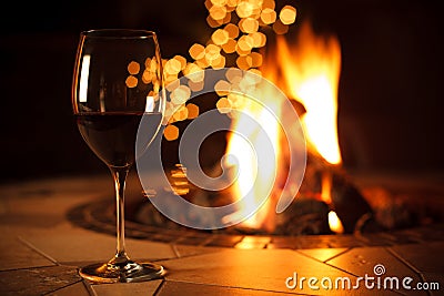 Fireside with a Glass of Wine Stock Photo