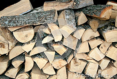 Firewood chopped for barbecue. Chopped wood for kindling. Stock Photo