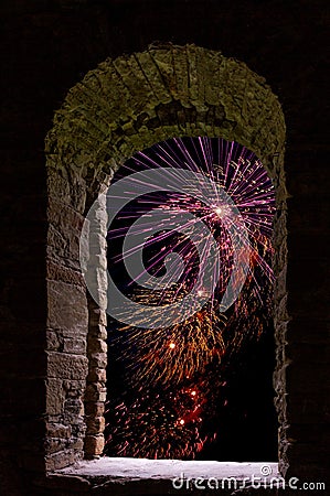 Firework framed stone window Stock Photo