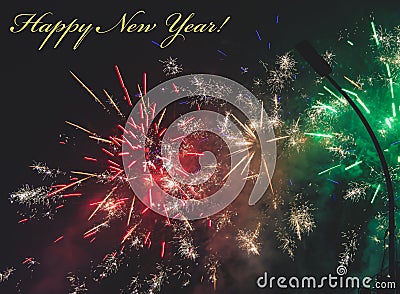 Firework multicolor with Happy new year text for greeting card or template Stock Photo