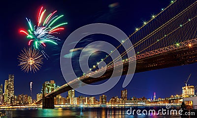 Firework over city at night with reflection in water Stock Photo