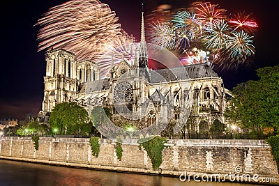 Firework over Notre Dame cathedral in Paris, France Stock Photo