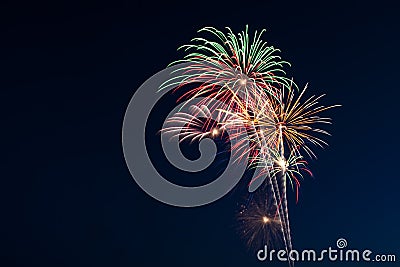 Beautiful fireworks display lights up the nighttime sky Stock Photo