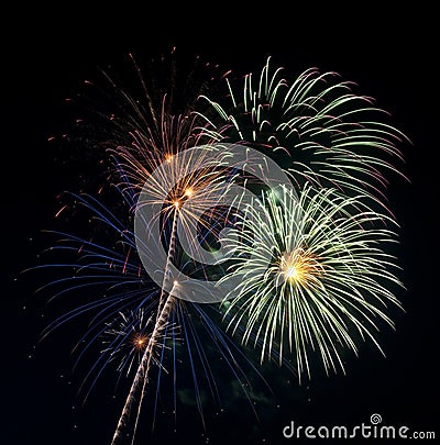 Beautiful fireworks display lights up the nighttime sky Stock Photo