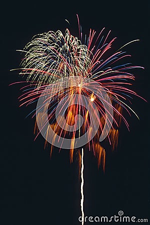 Beautiful fireworks display lights up the nighttime sky Stock Photo