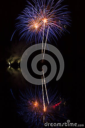 Fireworks above water, mirroring Stock Photo